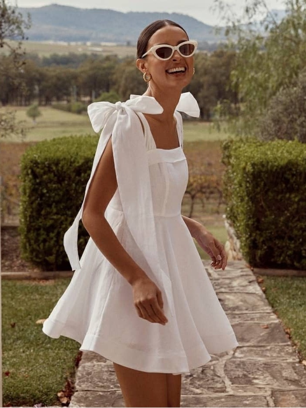 Dissh Aisle Linen Bow Mini Dress